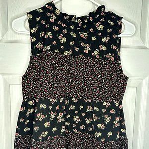 Black Flora blouse sleeve-less with mini ruffle neck line